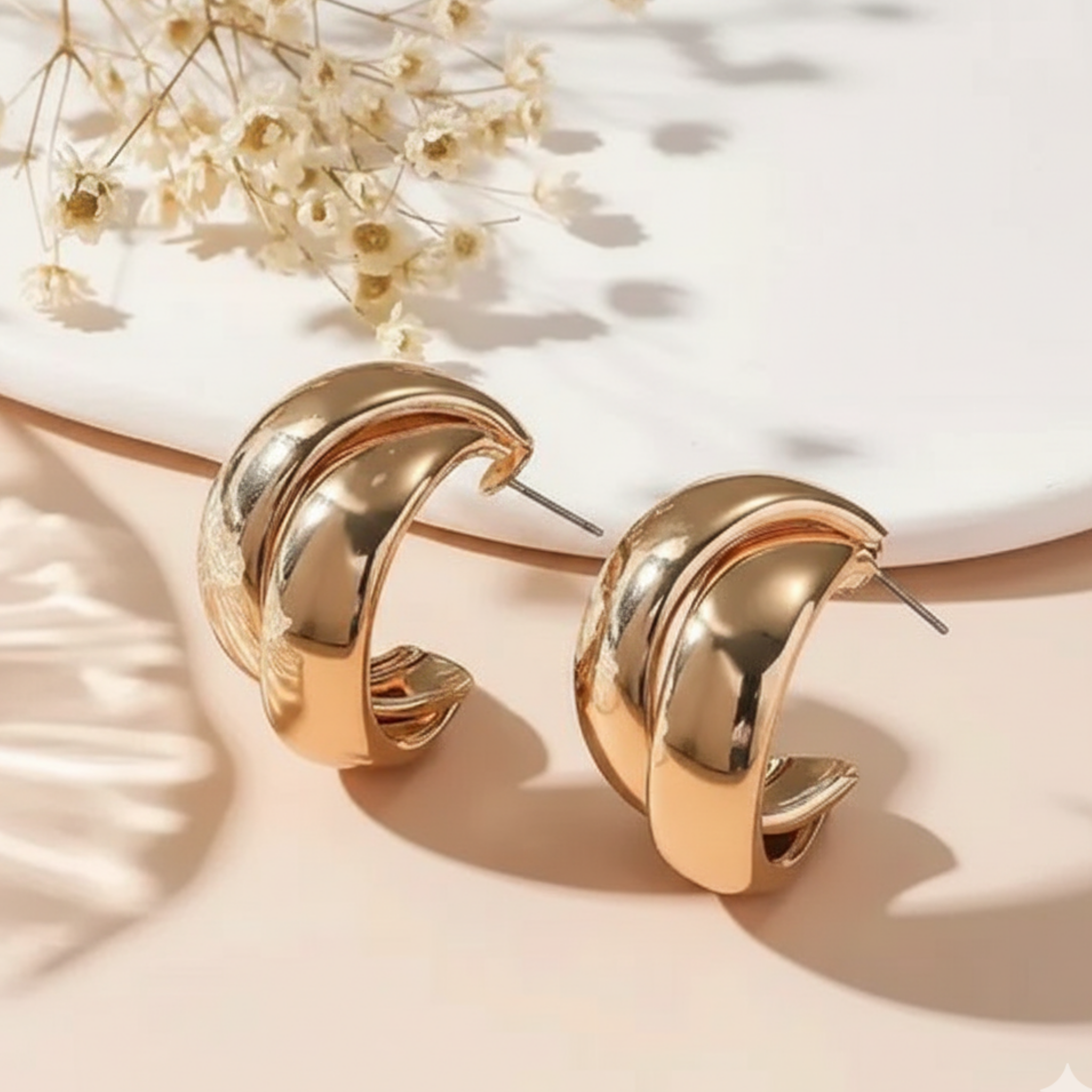 Chunky crossover hoop earrings