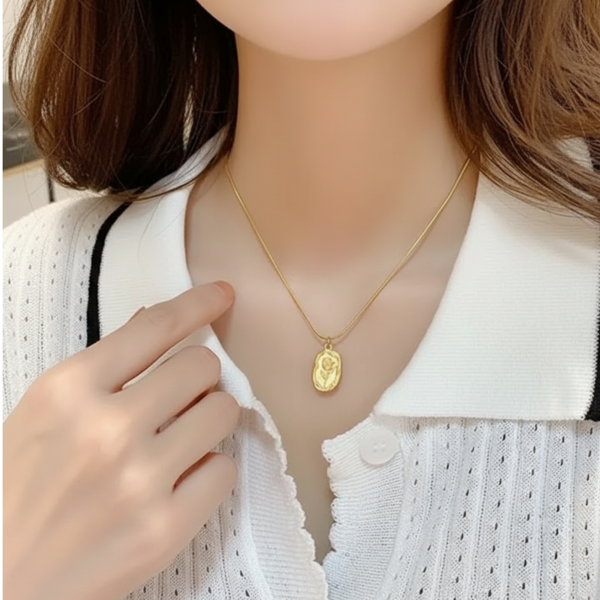 vintage-inspired medallion pendant with snack chain